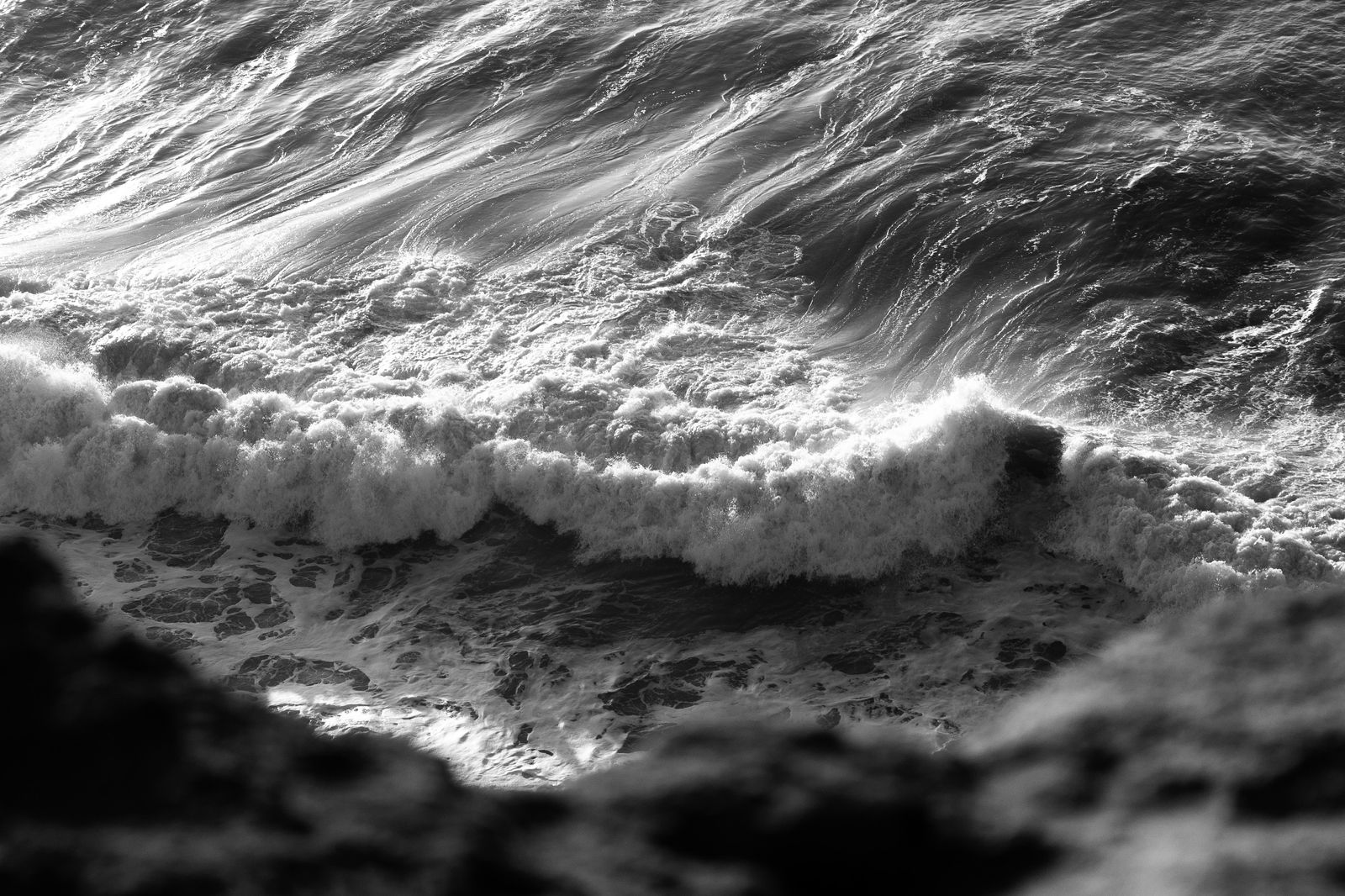 Black and white view of a breaking Atlantic wave